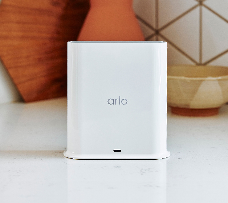  Arlo base station front facing on white granite counter top
